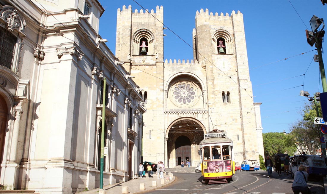 Lisbon Cathedral and a yellow tram